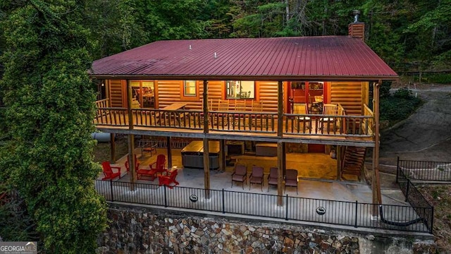 back of house featuring a patio area