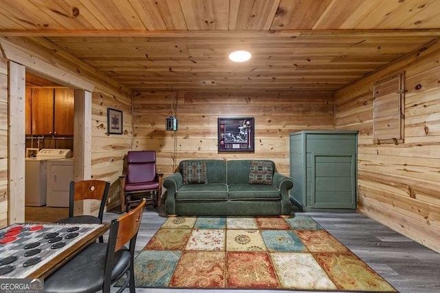 living room with washing machine and dryer, wooden ceiling, and dark hardwood / wood-style flooring