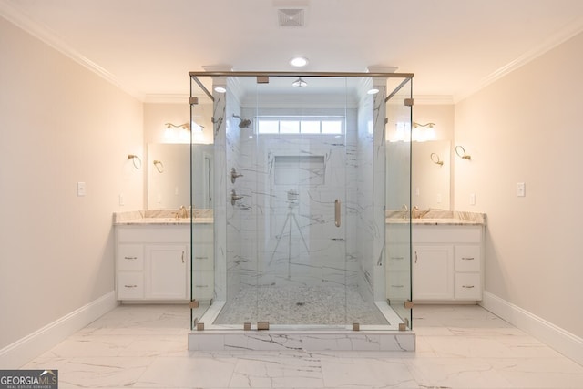 bathroom with vanity, crown molding, and a shower with door