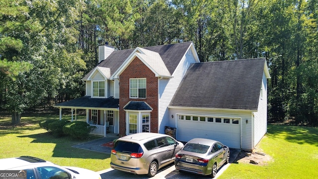 view of front property with a front yard and a porch