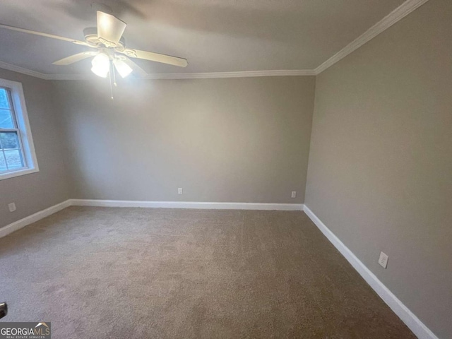 spare room with ornamental molding, ceiling fan, and carpet flooring