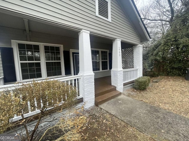 entrance to property with a porch