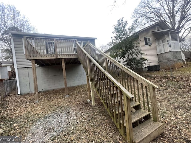 exterior space featuring central AC and a deck