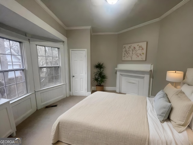 carpeted bedroom featuring ornamental molding