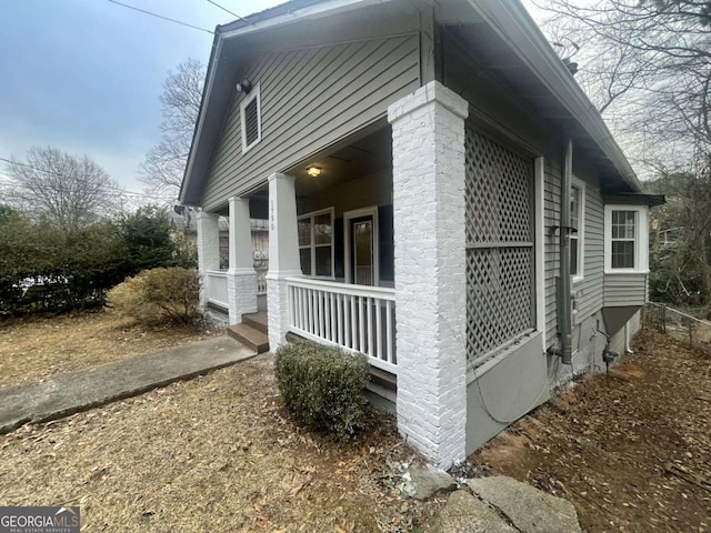 view of home's exterior featuring covered porch