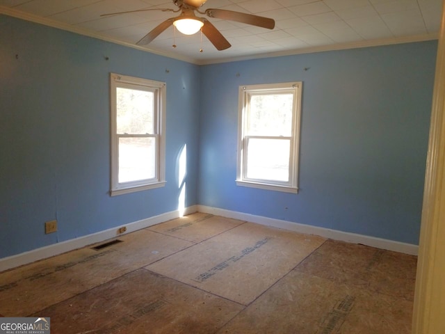 spare room with crown molding and ceiling fan