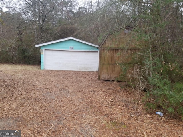 view of outdoor structure with a garage