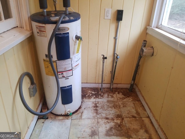 utility room with water heater