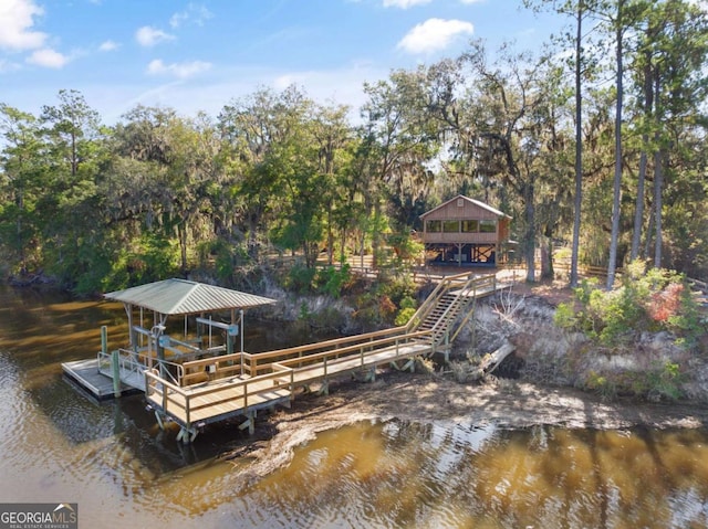 dock area featuring a water view