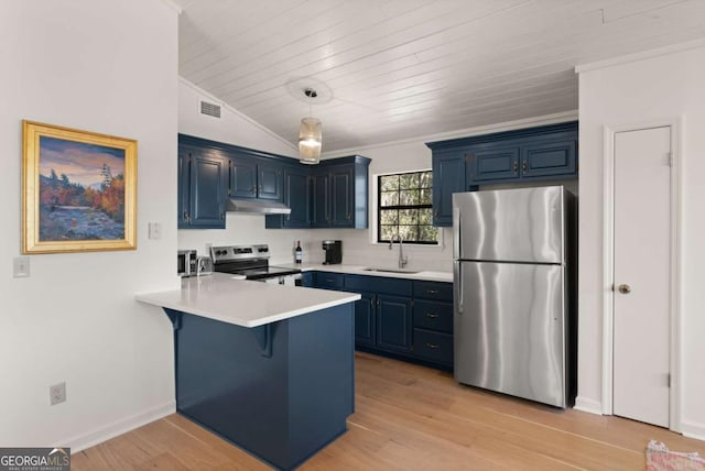 kitchen with stainless steel appliances, pendant lighting, and blue cabinets