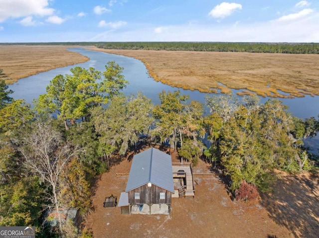 bird's eye view with a water view and a rural view