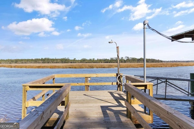 view of dock featuring a water view