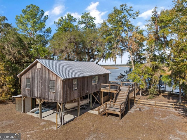 exterior space with a water view