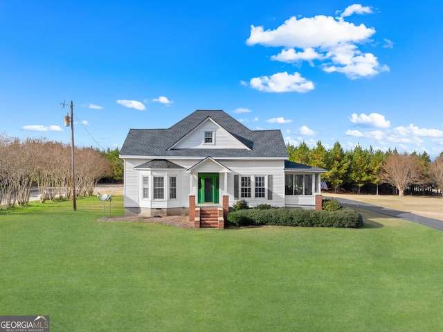 view of front of house with a front lawn