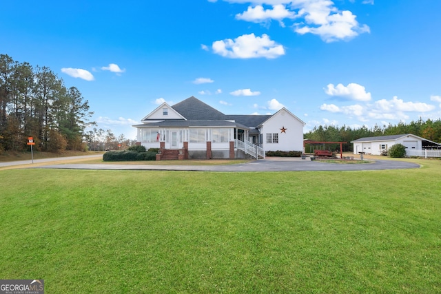 view of front of property with a front lawn