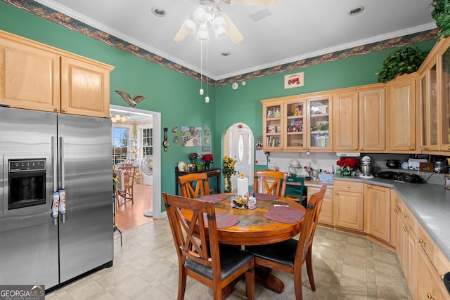 kitchen with crown molding, stainless steel fridge, ceiling fan, and light brown cabinets