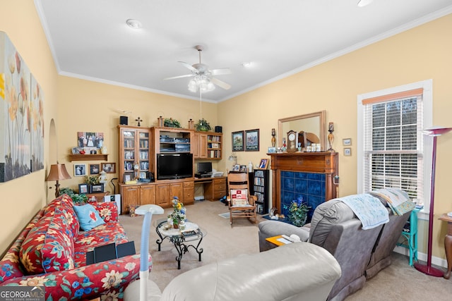 living room with crown molding, light carpet, and ceiling fan