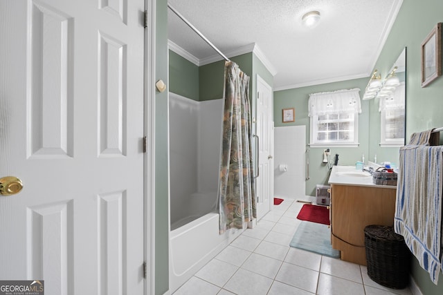 bathroom featuring crown molding, tile patterned flooring, vanity, a textured ceiling, and shower / bath combo with shower curtain