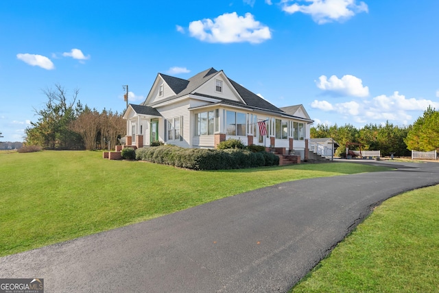 view of front of house with a front yard