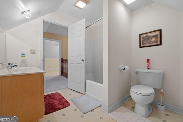 full bathroom with lofted ceiling, vanity, bathtub / shower combination, and toilet