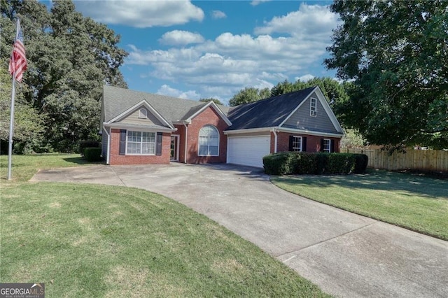 ranch-style home with a garage and a front yard