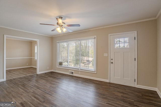 entryway with ceiling fan, ornamental molding, and dark hardwood / wood-style flooring