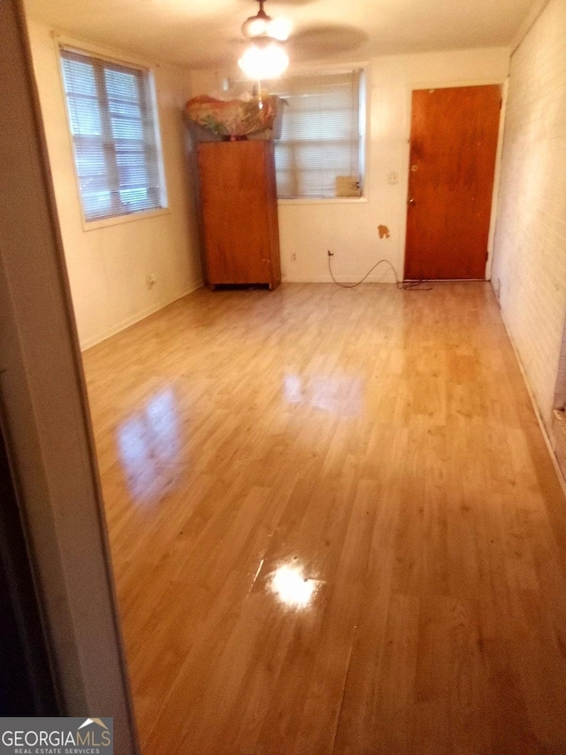 unfurnished dining area featuring light hardwood / wood-style flooring