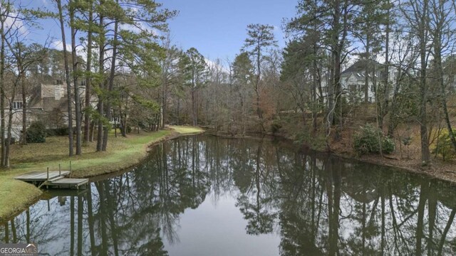 view of yard with a gazebo and a water view