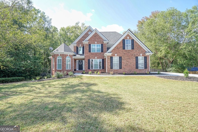 view of front of home featuring a front yard