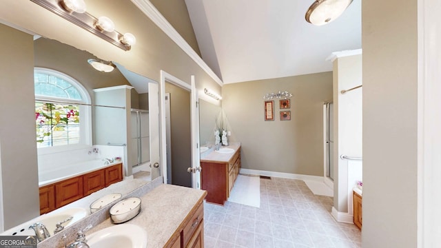 bathroom with vanity, lofted ceiling, and separate shower and tub