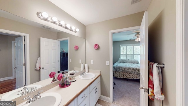 bathroom with vanity and ceiling fan