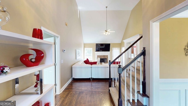 interior space with lofted ceiling and dark hardwood / wood-style floors