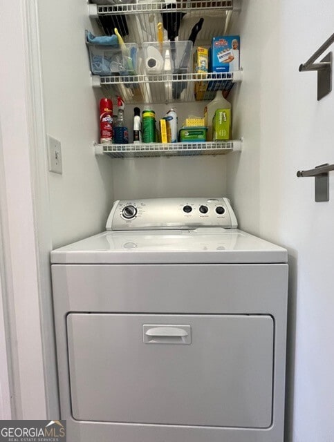 laundry room with washer / dryer