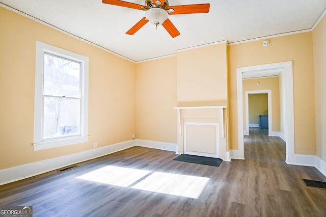 unfurnished room with crown molding, ceiling fan, and hardwood / wood-style flooring