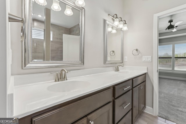 bathroom featuring vanity and ceiling fan