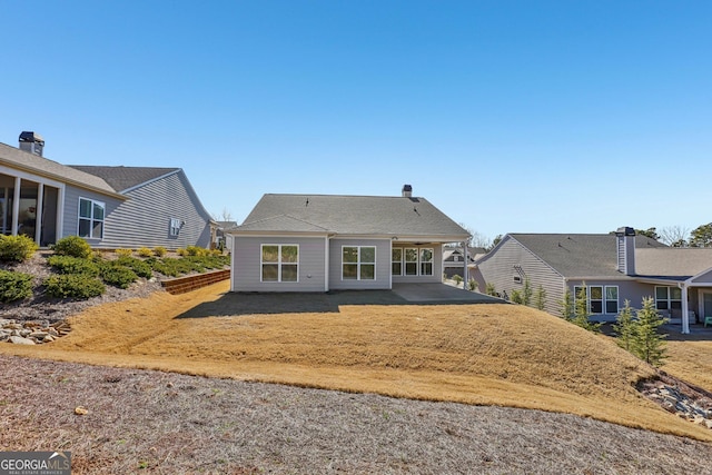 back of house featuring a patio