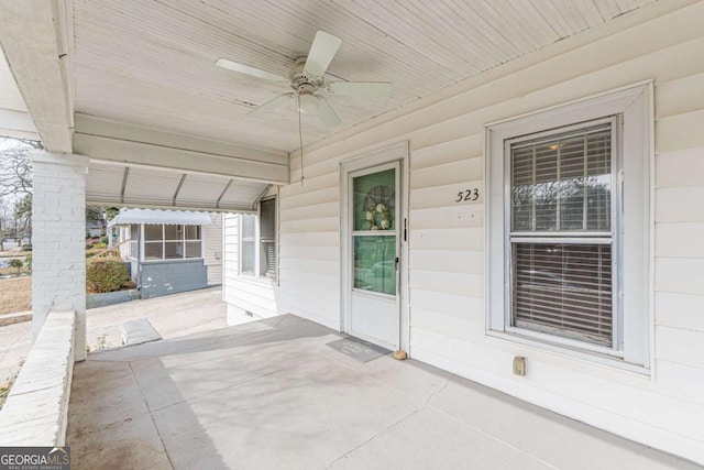 view of patio featuring ceiling fan