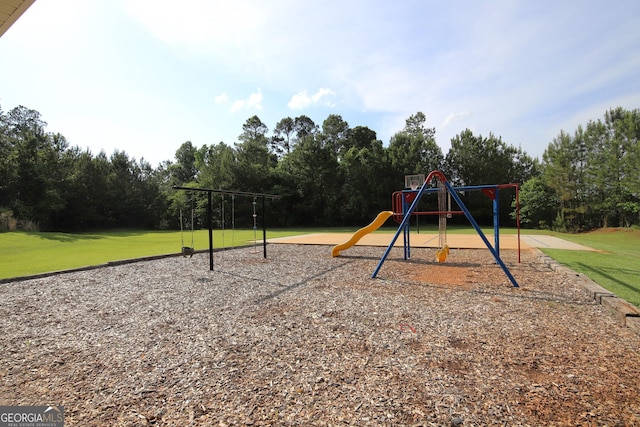 view of jungle gym featuring a yard