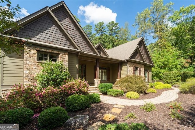 craftsman-style home featuring covered porch