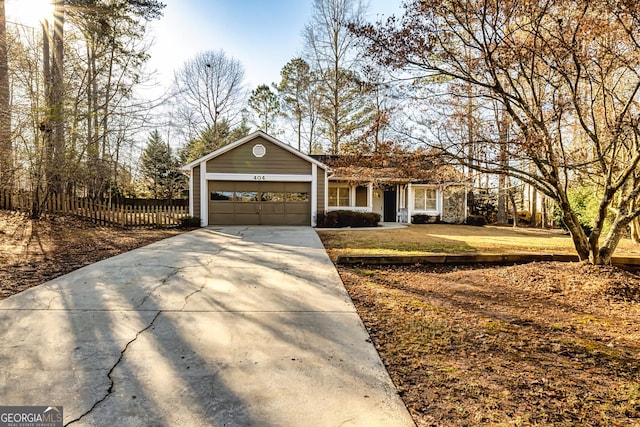 ranch-style home with a garage