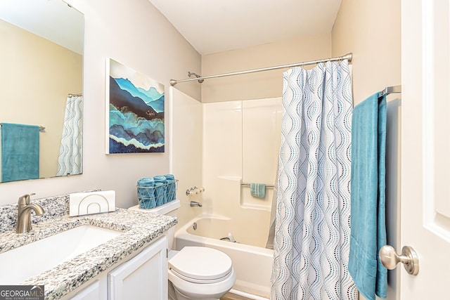 full bathroom featuring shower / tub combo with curtain, vanity, and toilet