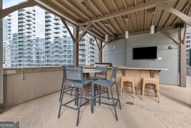 view of patio featuring a bar