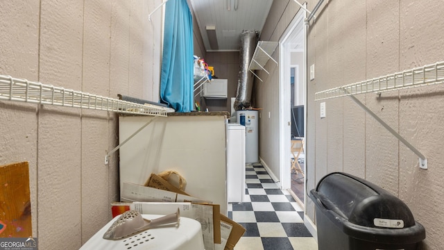 walk in closet featuring water heater