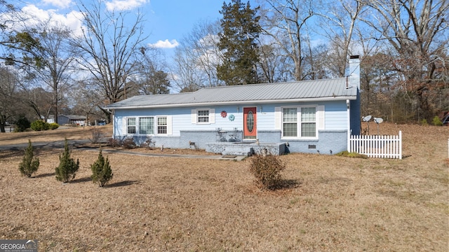 single story home featuring a front lawn