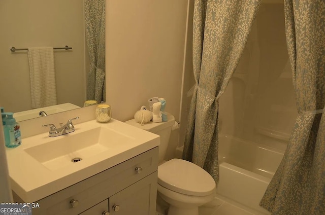 full bathroom featuring vanity, shower / bath combination with curtain, and toilet