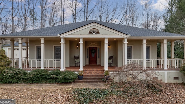 254 Ridgewood Rd, Clarkesville, GA 30523 - neoclassical / greek revival house with covered porch, stucco siding, and roof with shingles