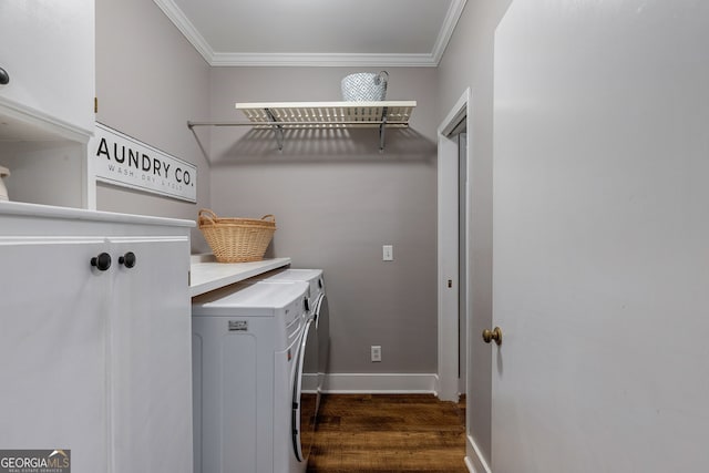 clothes washing area with separate washer and dryer, cabinets, ornamental molding, and dark hardwood / wood-style floors