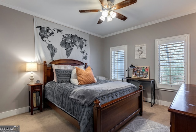 bedroom with crown molding, light colored carpet, and ceiling fan