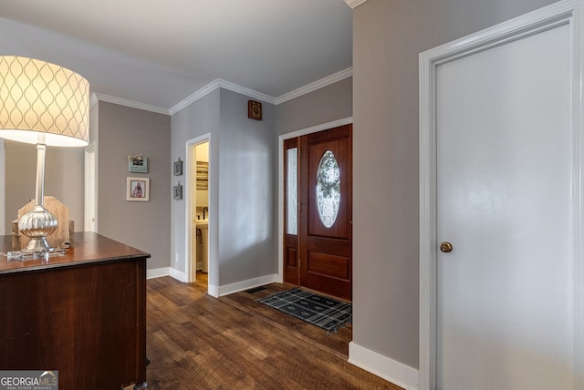 entrance foyer with dark wood-type flooring and crown molding