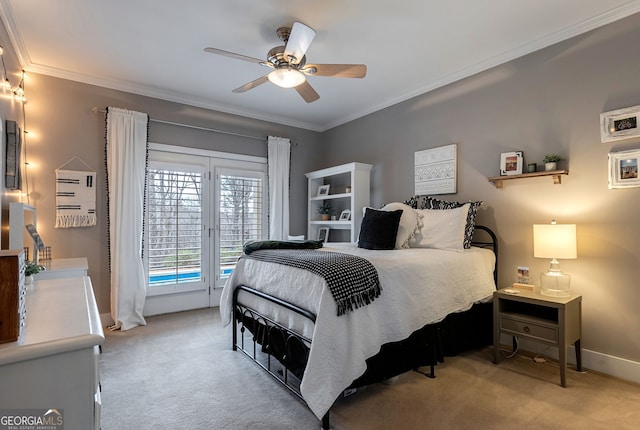 bedroom featuring ornamental molding, access to outside, and light colored carpet